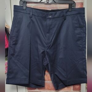 Men's size 36 navy blue slash pockets shorts. New. Slim fit